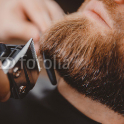 Macro-Man-hipster-having-barber-shave-barbershop-hair-machine.jpg
